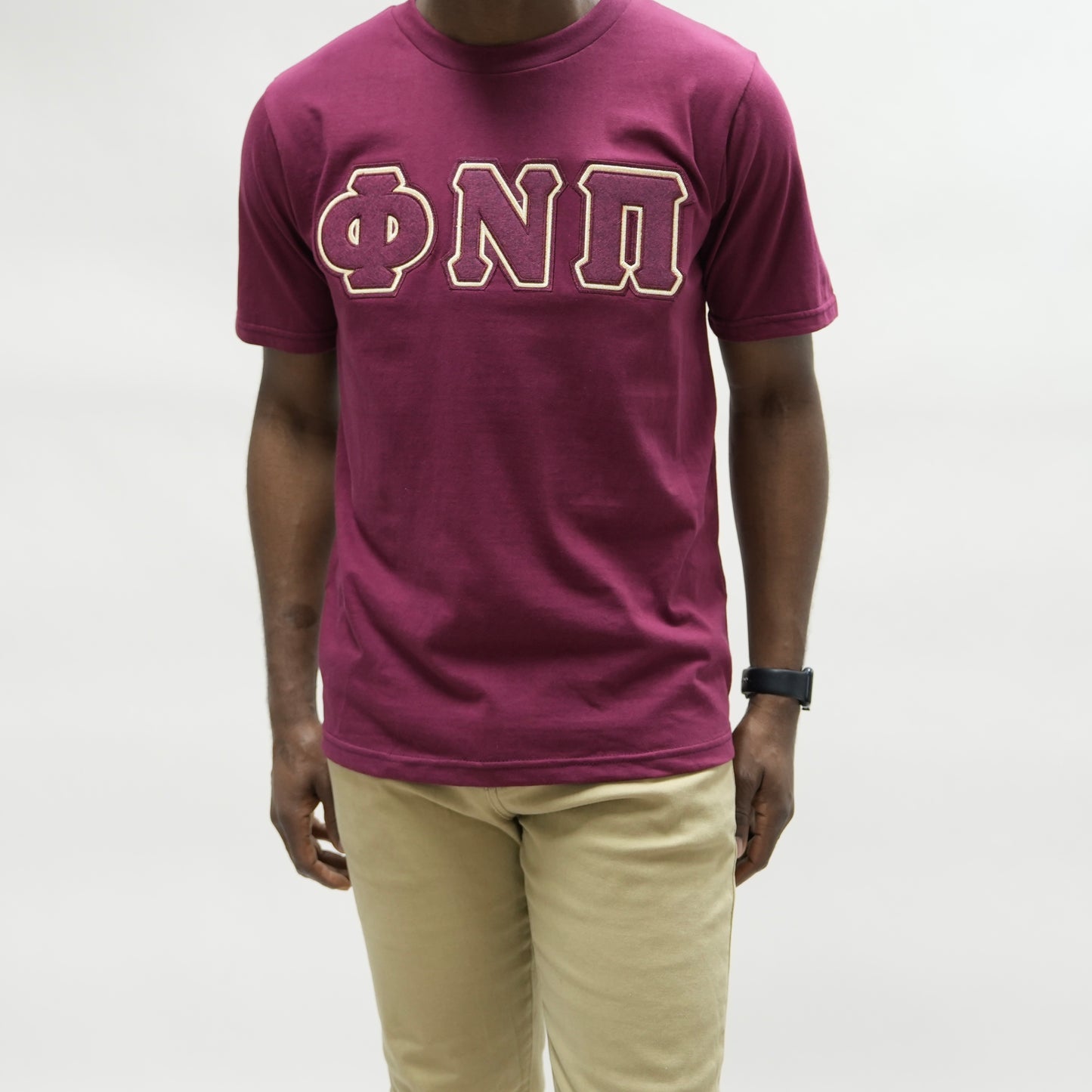 Show off your love for Kappa Alpha Psi with this stylish t-shirt. Made of high-quality cotton material, this white colored shirt features a solid pattern and short sleeves with a crew neckline. The regular fit shirt is perfect for any occasion and can be worn by any member of Kappa Alpha Psi.