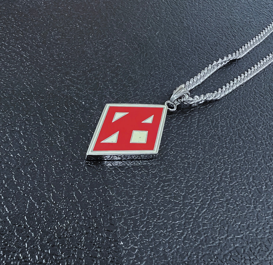 This Kappa Alpha Psi Crimson and Cream Necklace is a striking piece of jewelry that is sure to catch the eye of any Nupe or fraternity member. Made of high-quality materials, this necklace is durable and designed to last. Its gold or silver finish gives it a classic look that is perfect for wearing to formal events or as a statement piece.