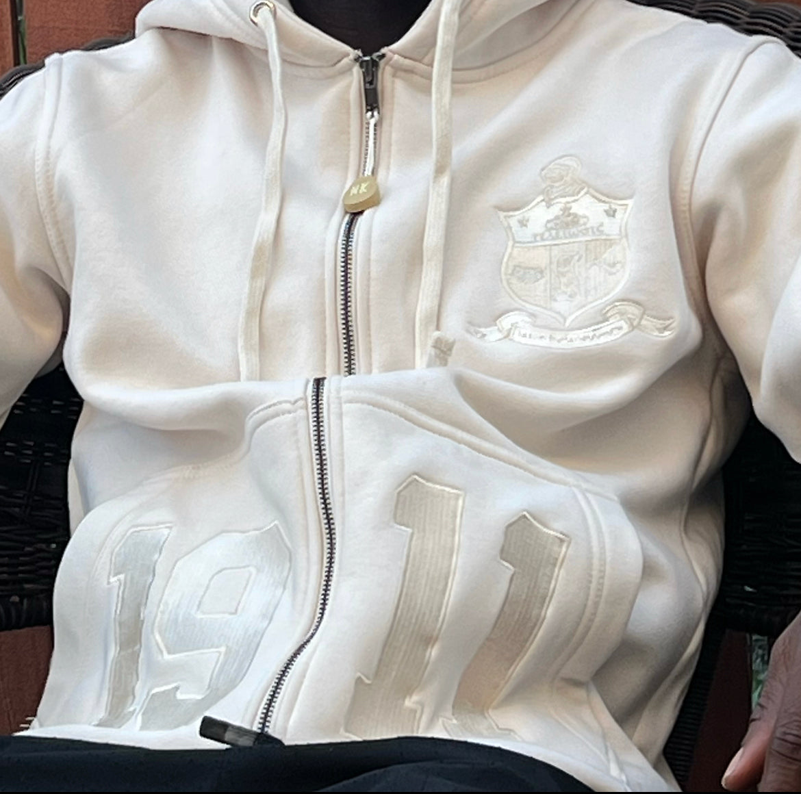 Stay warm and cozy with this Kappa Alpha Psi Cream Shield Hoodie. Designed with the fraternity members in mind, it features the iconic shield logo on the front and is perfect for any member Kappa Alpha Psi. Made with high-quality materials, this hoodie is durable and built to last through the years. Whether you're out and about or lounging at home, this hoodie is a must-have item for any Kappa Alpha Psi organization member.