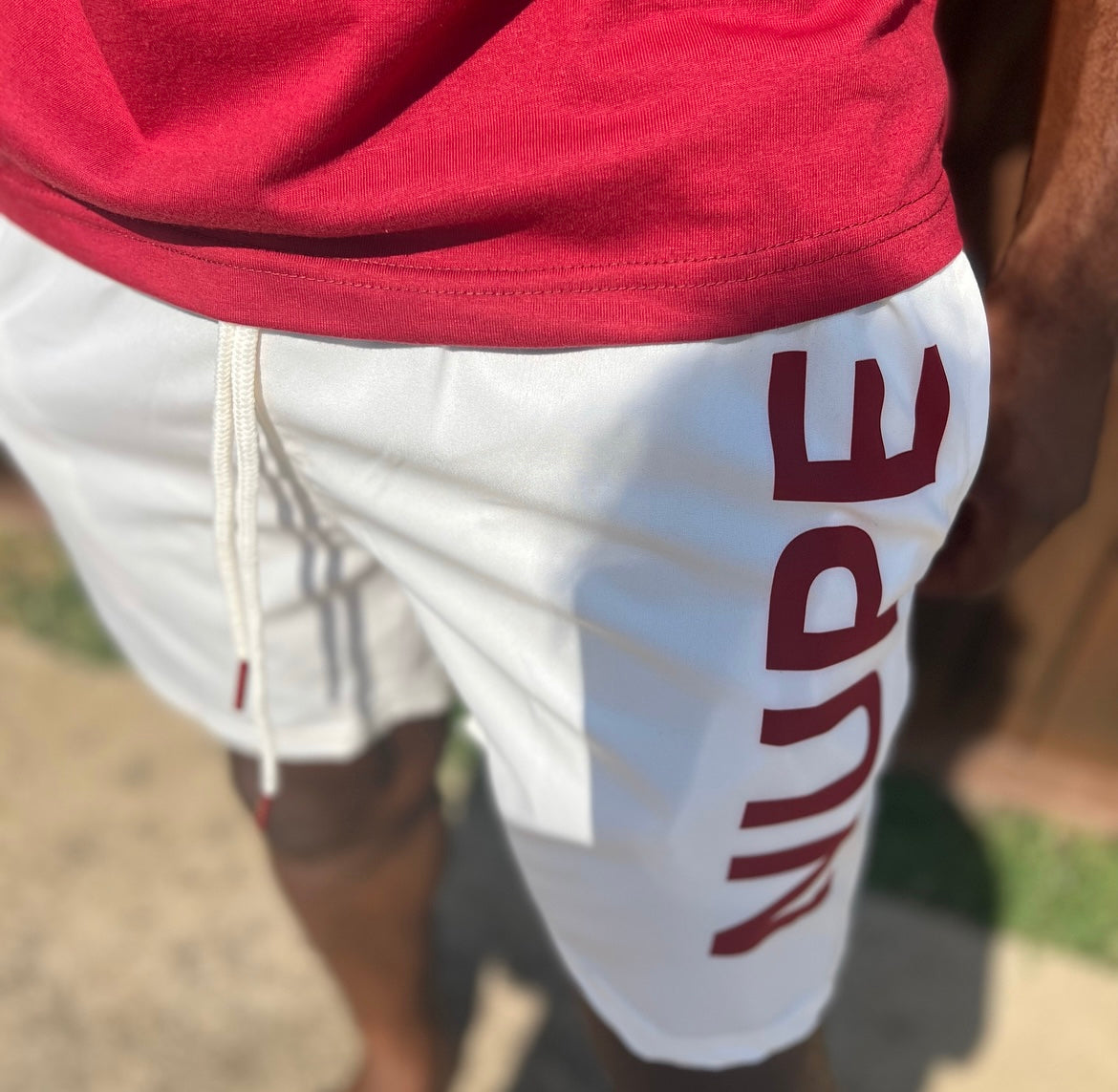 “NUPE” Cream Shorts