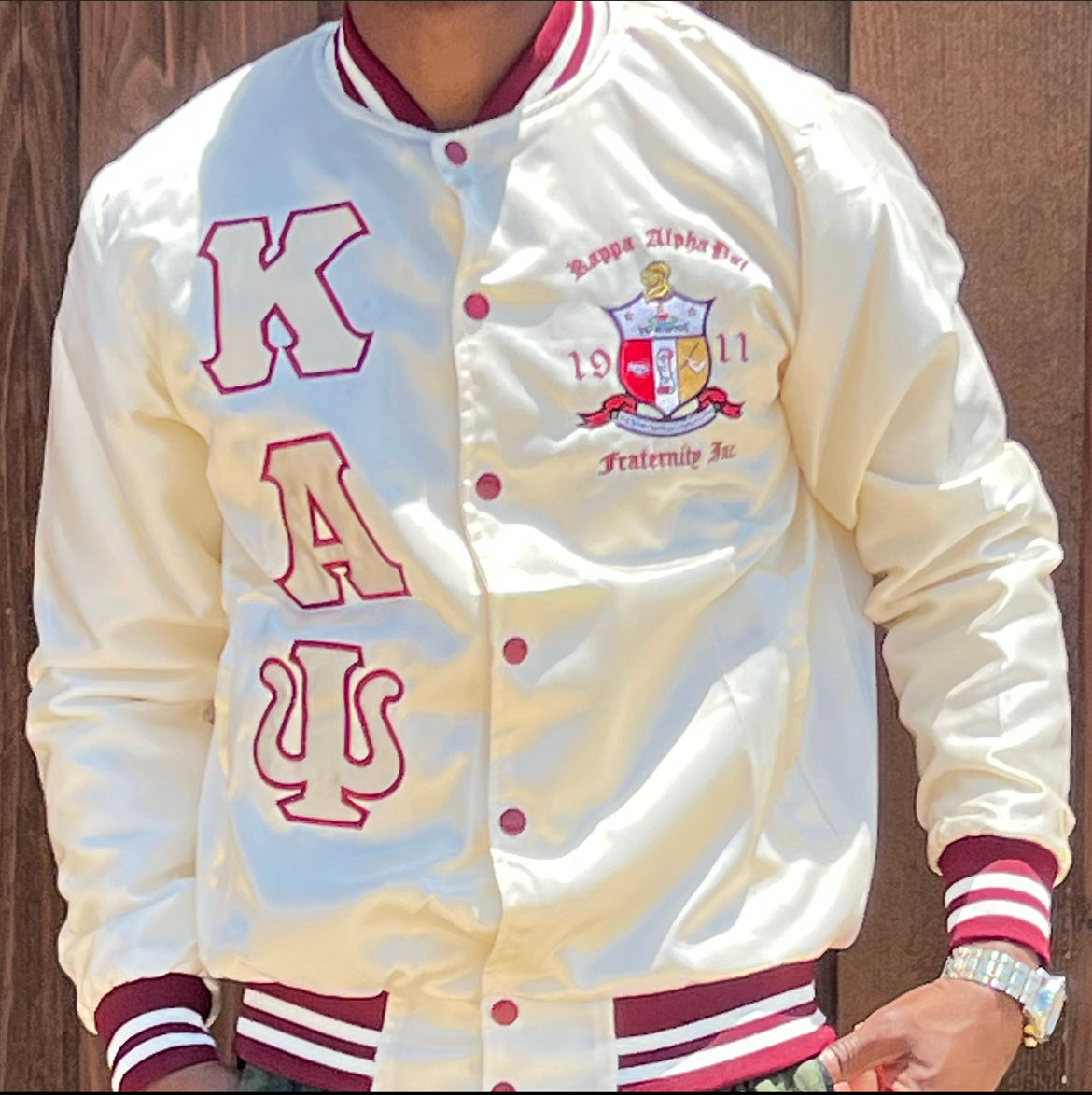 Check out our Kappa Alpha Psi satin jacket selection for the very best in unique design. This Kappa Alpha Psi Baseball Satin Jacket shows the fraternity Shield embroidered on left chest and Greek letters on right to create style and unique comfort in wear. Quality beyond imagination.