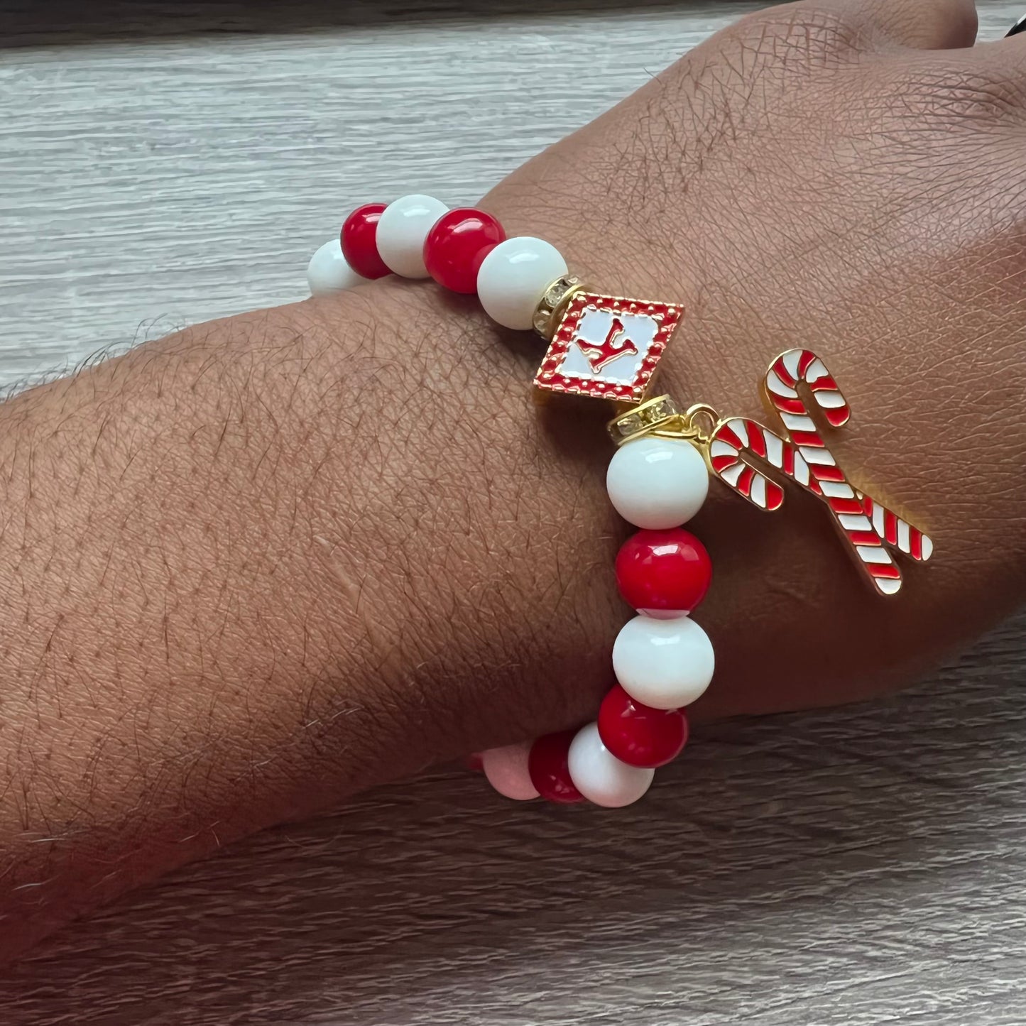 Kappa Alpha Psi fraternity exclusive Glass Beaded Bracelet on elastic stretch rope; simple and elegant. Easy bracelet to slide on and off wrist. The color of amber beads may vary from bracelet to bracelet due to each bracelet being hand made from natural materials with a personal touch.