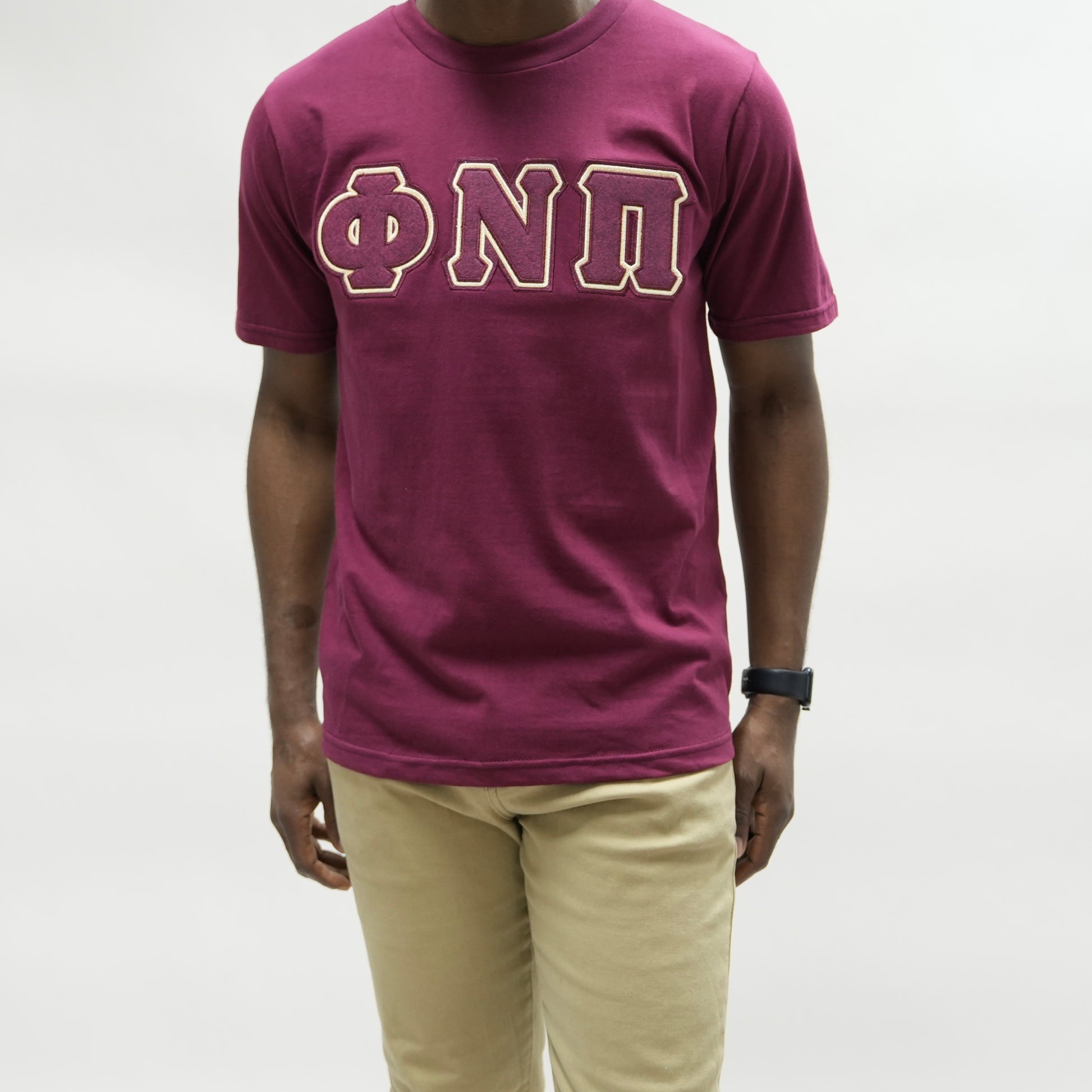 Show off your love for Kappa Alpha Psi with this stylish t-shirt. Made of high-quality cotton material, this white colored shirt features a solid pattern and short sleeves with a crew neckline. The regular fit shirt is perfect for any occasion and can be worn by any member of Kappa Alpha Psi.

