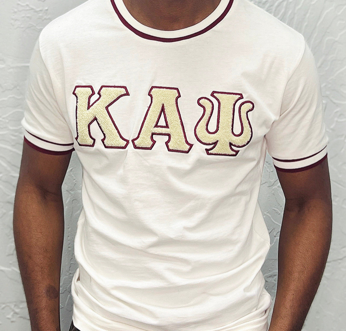 Show off your love for Kappa Alpha Psi fraternity with this stylish and eye-catching red T-shirt from the world brand of Nupe Kave. Perfect for any occasion, this shirt is made from high-quality materials and is designed to be comfortable and durable. Whether you're attending a social event or relaxing at home, this shirt is sure to turn heads.