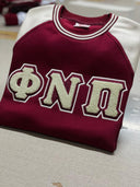 Kapsi Chinelle Phi Nu Pi Sweatshirt