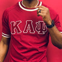 Show off your love for Kappa Alpha Psi fraternity with this stylish and eye-catching red T-shirt from the world brand of Nupe Kave. Perfect for any occasion, this shirt is made from high-quality materials and is designed to be comfortable and durable. Whether you're attending a social event or relaxing at home, this shirt is sure to turn heads.