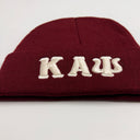 Show off your Kappa Alpha Psi pride with this stylish crimson beanie. Made for Nupes, this beanie is perfect for any occasion and is sure to turn heads. The beanie features the iconic Kappa logo and is made with high-quality materials to ensure durability and comfort.
