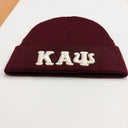 Show off your Kappa Alpha Psi pride with this stylish Dark Crimson Beanie. Made for Nupes who want to make a statement, this beanie is the perfect accessory to complete any outfit. The dark crimson color is sure to turn heads and the Kappa Alpha Psi logo adds a touch of sophistication to your look.

