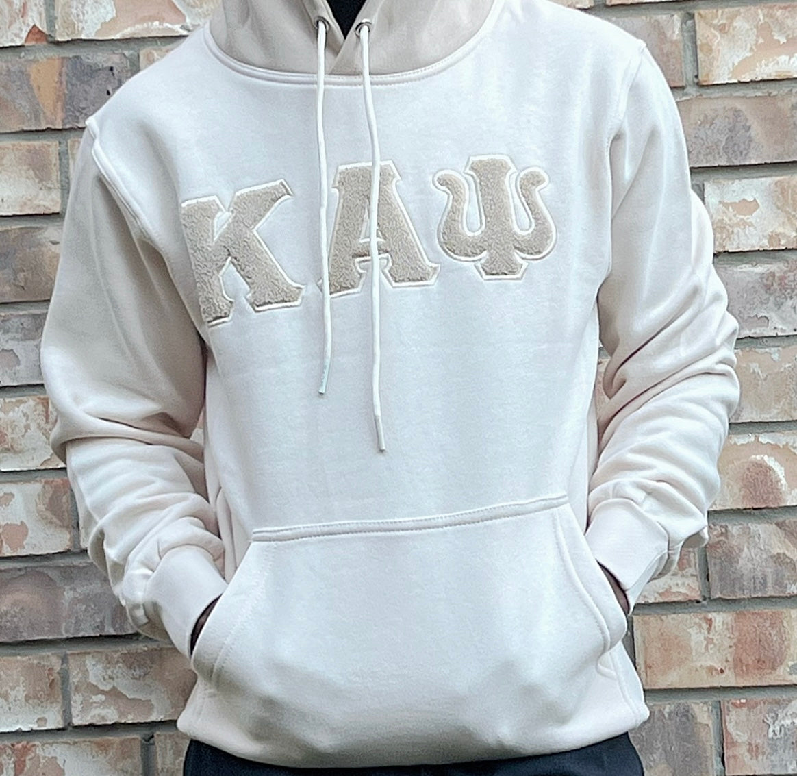 Exclusive Kappa Alpha Psi Chenille Embroidery Lettered Hoodie. This is the perfect long-sleeved hoodie to wear while showing off your Kappa Alpha Psi fraternity lettering. A comfortable 100% cotton tee with a twill Greek letters embroidery across the chest give you the perfect fit. This hoodie is also a perfect gift or your favorite Kappa Man.