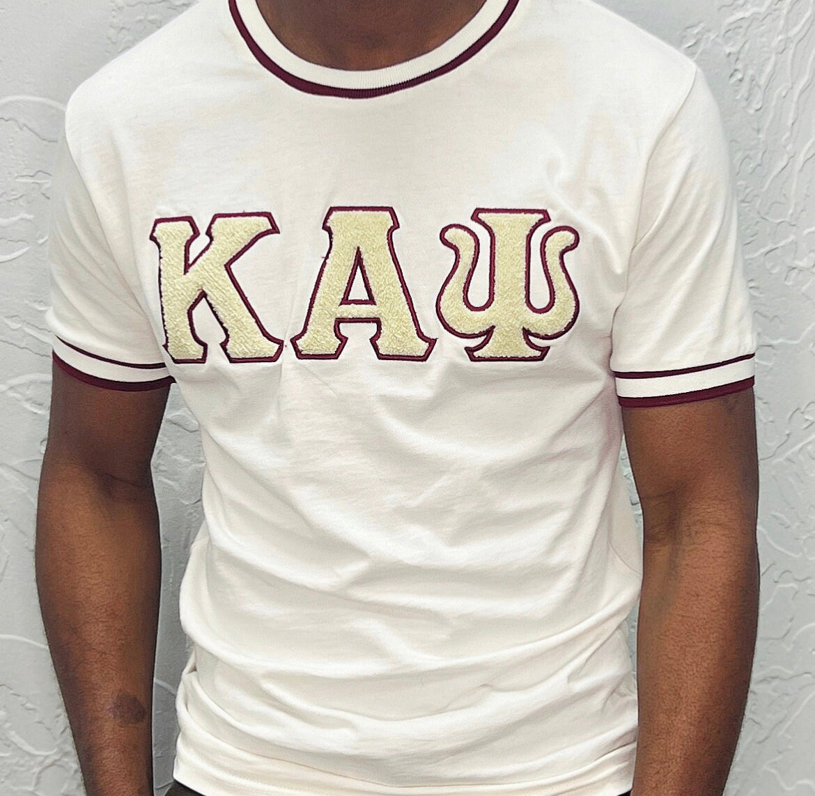 Show off your love for Kappa Alpha Psi fraternity with this stylish and eye-catching red T-shirt from the world brand of Nupe Kave. Perfect for any occasion, this shirt is made from high-quality materials and is designed to be comfortable and durable. Whether you're attending a social event or relaxing at home, this shirt is sure to turn heads.