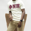 This Kappa Alpha Psi “Phi Nu Pi” cream T-shirt is a must-have for any fraternity member. Show off your organization’s pride with this stylish and comfortable shirt. The shirt is made of high-quality material and is perfect for any casual occasion. The design is eye-catching and unique, making it stand out from the rest. Whether you’re at a party or just hanging out with Nupes, this T-shirt is sure to make a statement. Add it to your collection today and wear your pride on your sleeves.