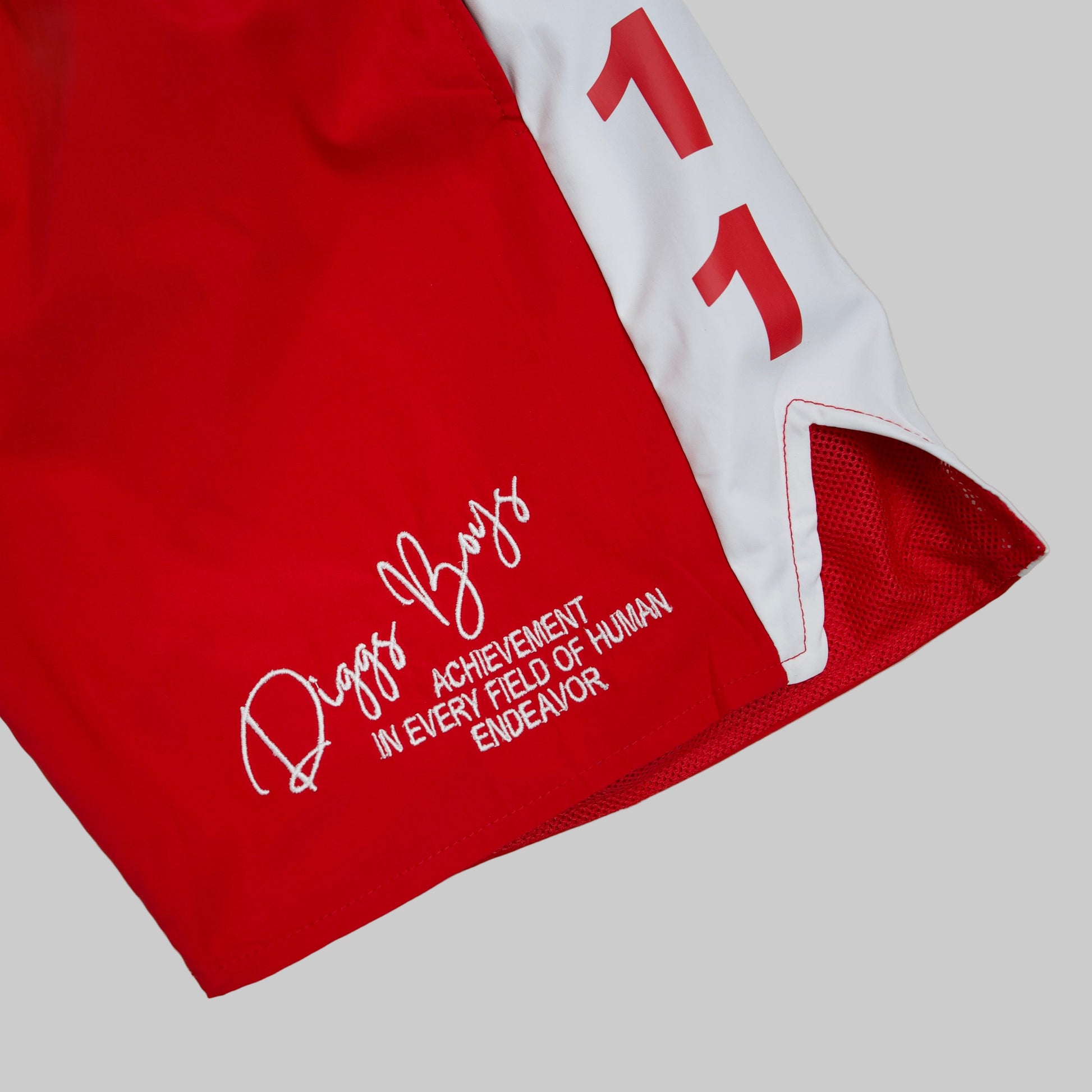 Red shorts with white text and logo on a light gray background.The Kappa Alpha Psi red Summer Short is a collectible item that represents the historical memorabilia of Kappa Alpha Psi Fraternity Inc . It is a symbol of pride and heritage for members of the Kappa Alpha Psi Fraternity, showcasing their commitment to their values and traditions from 1911. This short is a tangible piece of history that serves as a reminder of the legacy and contributions of the organization.