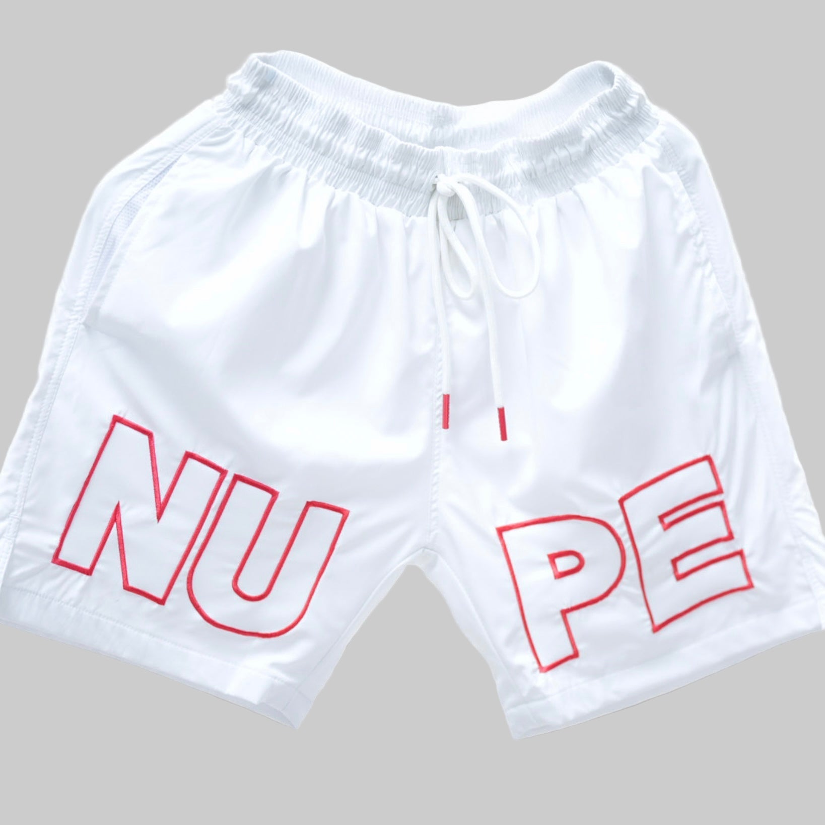 Get ready for summer with these Kappa Alpha Psi “NUPE” shorts! Perfect for any fraternity functions , these shorts are a must-have addition to your summer wardrobe. Made with high-quality materials, they are both comfortable and stylish.White shorts with red text on a gray background