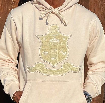 The cream color adds a touch of sophistication to your wardrobe and is perfect for any occasion. With its comfortable fit and classic design, this hoodie is sure to become a staple in your collection. Show off your pride and support for Kappa Alpha Psi with this stylish and functional piece of clothing.