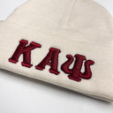 Show off your love for Kappa Alpha Psi with this cream beanie. This collectible item is a perfect addition to your historical memorabilia collection. Represent your favorite fraternal organization with pride and add this beanie to your wardrobe today. Perfect for any occasion, this beanie is sure to spark conversations and show off your unique style.