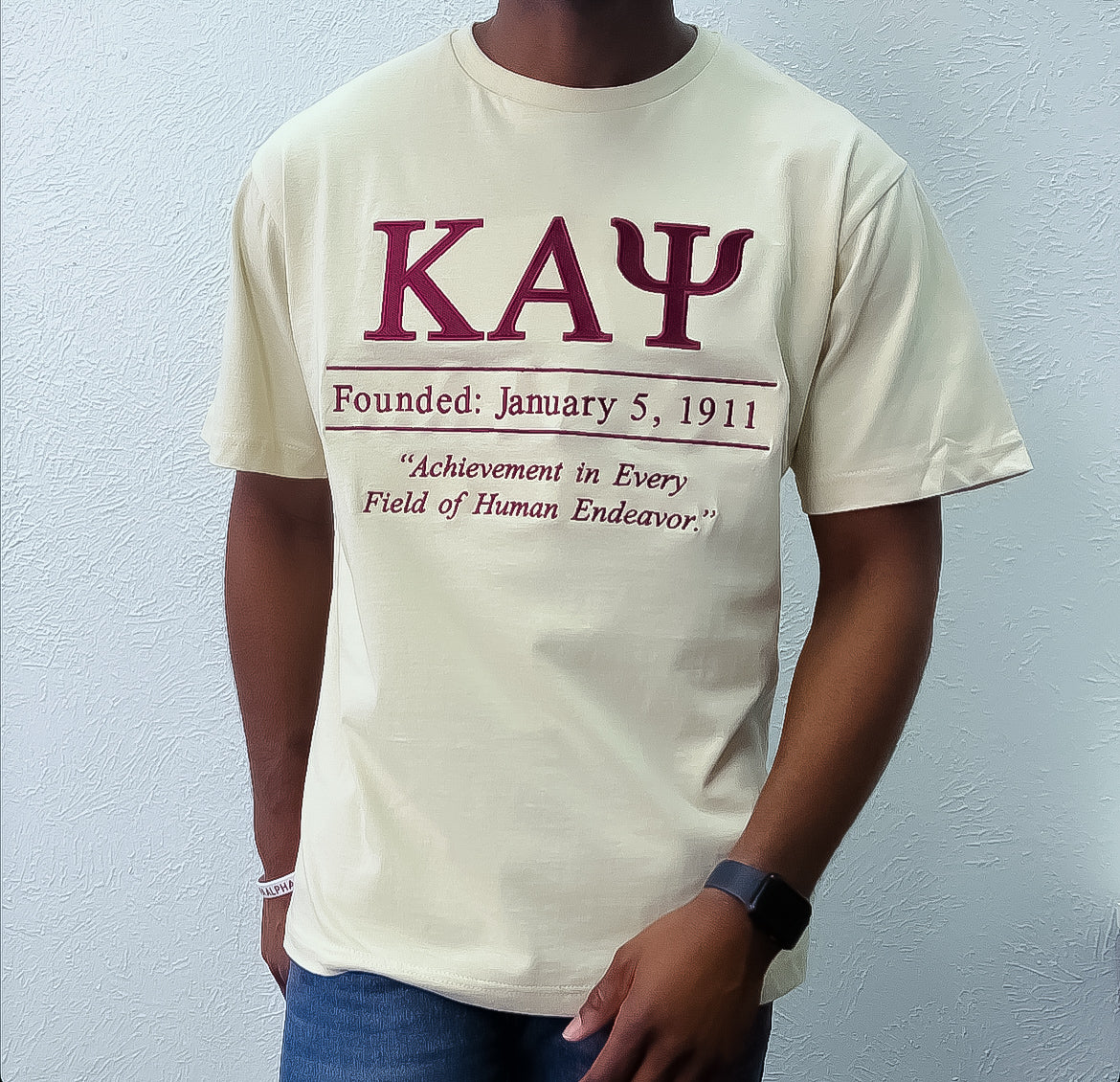 Show off your Kappa Alpha Psi pride with this stunning Embroidery and Chenille Shield T Shirt in Cream and Crimson colors. Perfect for members and supporters of the Fraternity &amp; Organization, this shirt is a must-have for any fan of historical memorabilia.