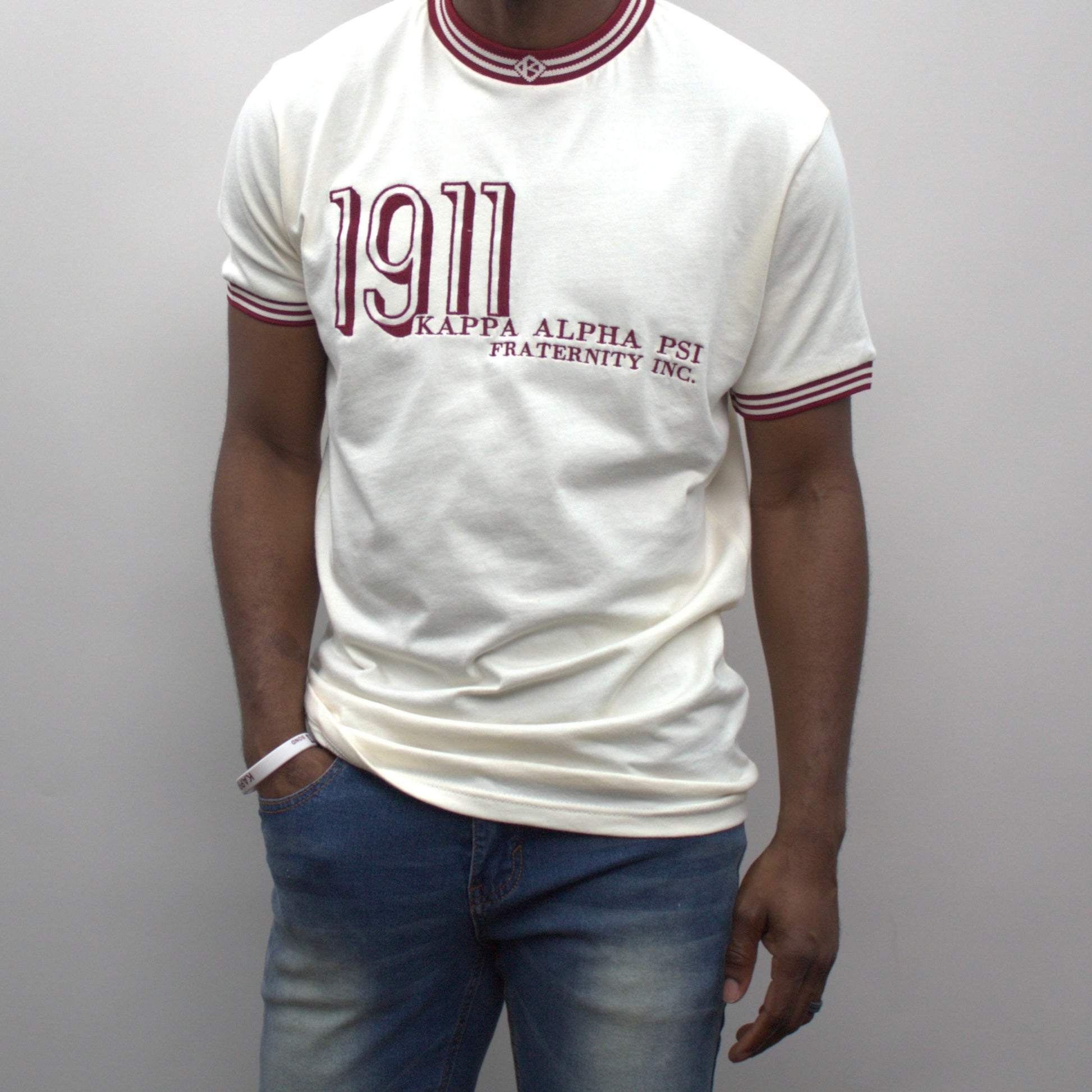 This vintage Kappa Alpha Psi cream shirt from 1911 is a must-have for any avid collector of historical memorabilia. The shirt is adorned with the iconic Greek letters of the Fraternity organization, making it a valuable addition to any collection.

The shirt's rich history and significance in the Fraternal Organizations community make it a unique and sought-after piece. Don't miss out on the opportunity to own a piece of history.
