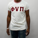 Featuring the iconic Phi Nu Pi logo, this shirt is a must-have for any member of the fraternity. The bold cream color is sure to make you stand out in a crowd, and the shirt's classic design means it will never go out of style. So why wait? Add this Phi Nu Pi T-shirt to your collection today and show off your love for one of the most respected fraternities in the world.