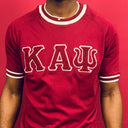 Show off your love for Kappa Alpha Psi fraternity with this stylish and eye-catching red T-shirt from the world brand of Nupe Kave. Perfect for any occasion, this shirt is made from high-quality materials and is designed to be comfortable and durable. Whether you're attending a social event or relaxing at home, this shirt is sure to turn heads.