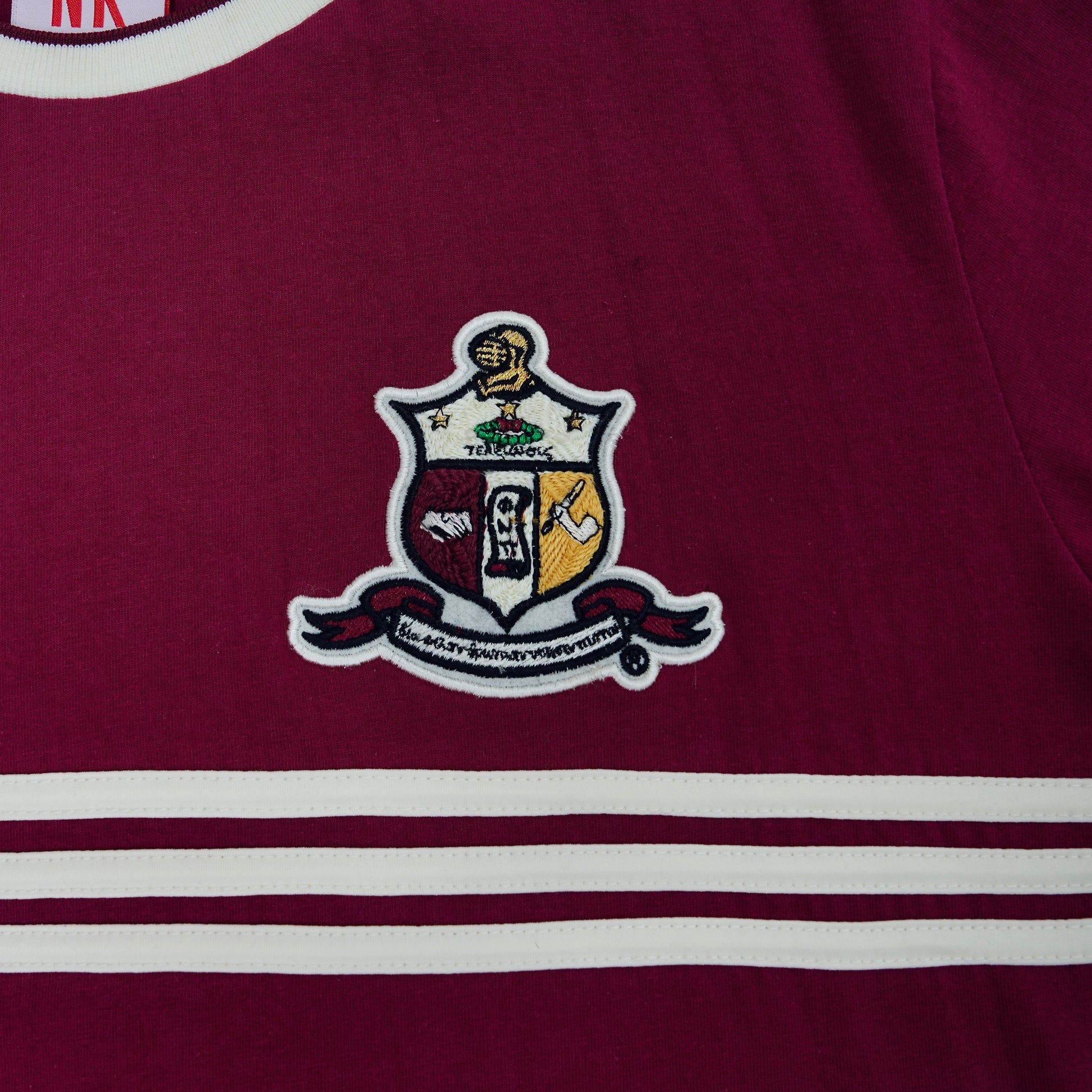 The&nbsp;Kappa Alpha Psi Coat of Arms T-Shirt is a stylish and comfortable option for brothers of the Kappa Alpha Psi fraternity. Featuring the iconic coat of arms of the organization, this shirt proudly displays the brand's heritage and values. Made from high-quality materials, this T-shirt is a great addition to any Nupes wardrobe, allowing him to show off his affiliation with Kappa in a casual and fashionable way.