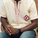 The product is Kappa Alpha Psi African Wear, specifically designed for members of the prestigious African American fraternity. This apparel is a symbol of pride and unity among the members of the organization, showcasing their heritage and cultural background. With the iconic symbols and colors of Kappa Alpha Psi, this African wear is a must-have for any member looking to represent their fraternity in a stylish and meaningful way.