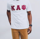 Show off your love for Kappa Alpha Psi with this stylish t-shirt. Made of high-quality cotton material, this white colored shirt features a solid pattern and short sleeves with a crew neckline. The regular fit shirt is perfect for any occasion and can be worn by any member of Kappa Alpha Psi.