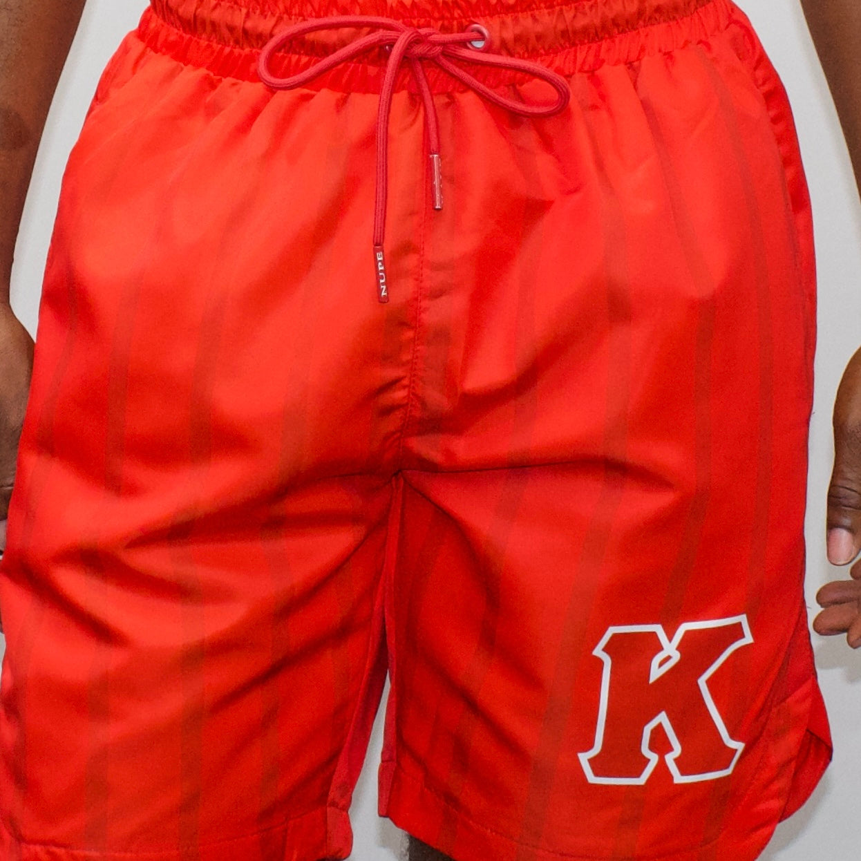 Featuring a regular size fit, these shorts are perfect for any occasion. Whether you're heading to the beach or attending a summer BBQ, these shorts will keep you looking sharp and stylish. With their timeless design and superior quality, these Kappa Alpha Psi shorts are a must-have addition to any wardrobe.