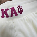 Elevate your fraternity experience with these Kappa Alpha Psi Diamond Shorts. Designed specifically for members of the iconic fraternity KAPsi, these shorts are a must-have for any Nupe. The stunning diamond design adds a touch of elegance and sophistication to any outfit, making them perfect for events or casual outings.Crafted with high-quality materials and attention to detail, these shorts are sure to impress. Show off your pride in your fraternity with these stylish and unique shorts.