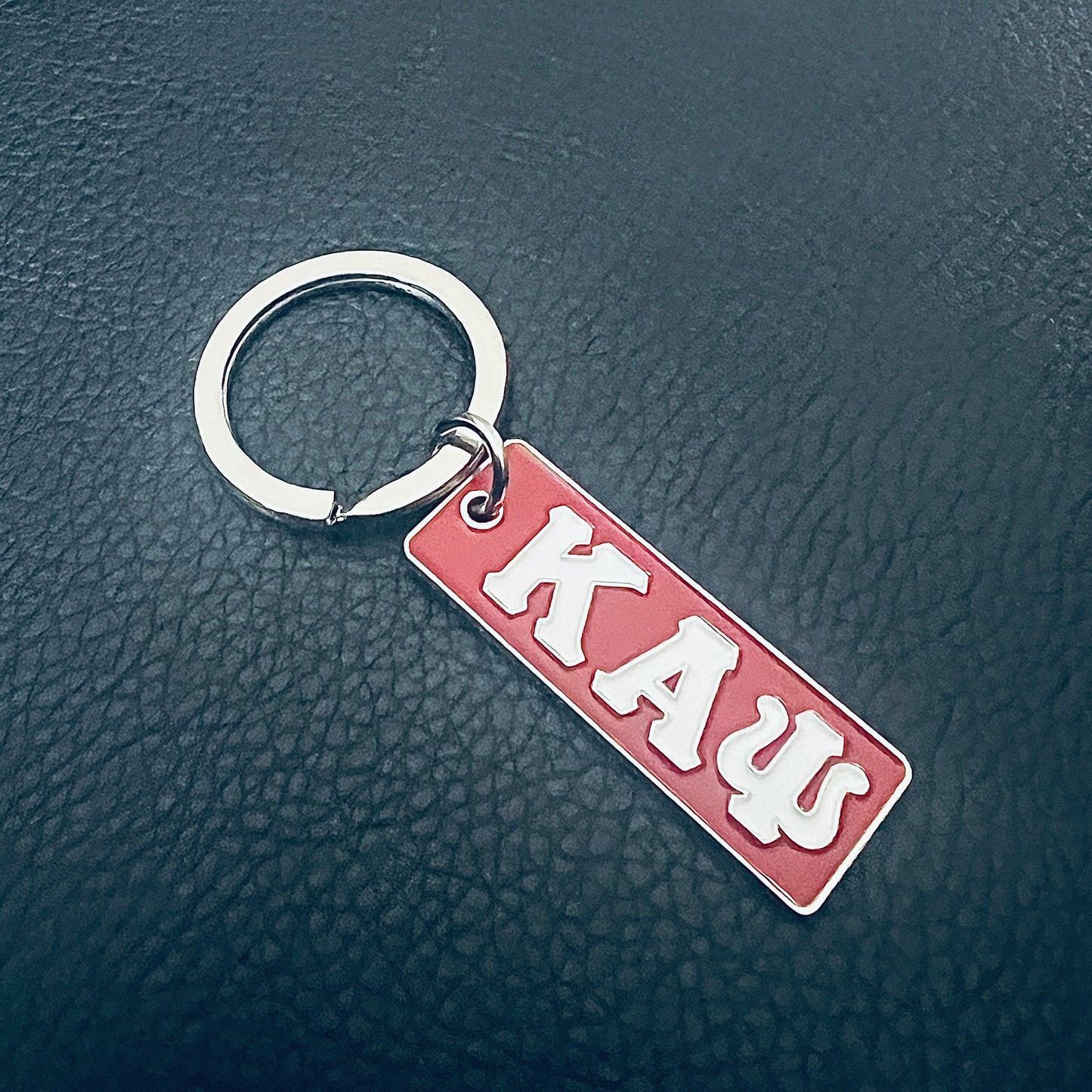 This Kappa Alpha Psi Shield Key Chain is a must-have for any fraternity enthusiast. The intricate design and attention to detail make this key chain a true work of art.