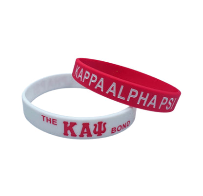 Show your pride for Kappa Alpha Psi with this "THE BOND" silicone band. Perfect for fraternity members, this collectible is a must-have for any historical memorabilia or fraternal organization enthusiast. The bold design features the iconic Kappa Alpha Psi emblem, making it a great addition to any jewelry collection. Made of high-quality silicone, this band is durable and suitable for everyday wear.