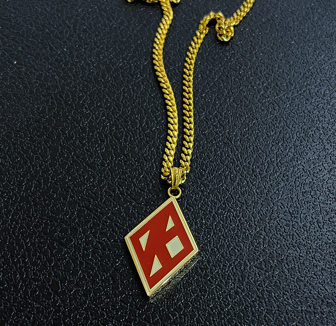 Ideal for members of the Kappa Alpha Psi fraternity, this necklace is a must-have item for anyone looking to show off their Greek Kappa pride. Whether you're looking to add to your collection of fraternal organization memorabilia or simply looking for a stylish accessory, this Crimson and Cream Necklace is the perfect choice.