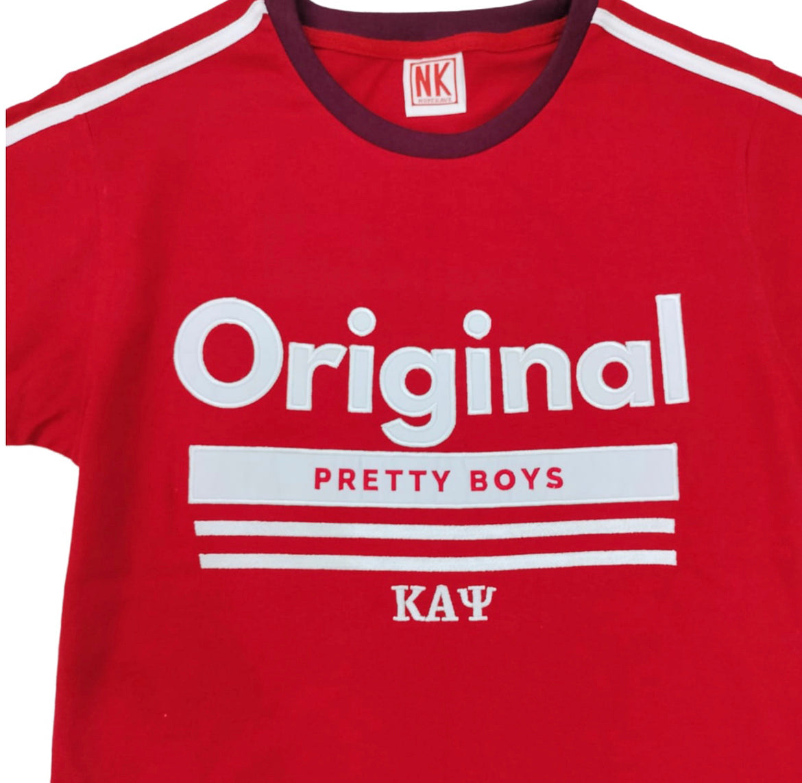 This original Kappa Alpha Psi T-shirt features beautifully embroidered details with the fraternity's iconic colors of red and white. Perfect for any member of the Fraternity, this shirt is a must-have collectible for those who appreciate historical memorabilia.