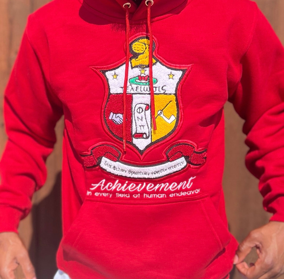 Introducing the Kappa Alpha Psi "Shield" hoodie, a stylish and comfortable addition to any wardrobe. Showcasing the iconic shield logo of the historic fraternity, this hoodie is perfect for any Kappa Alpha Psi member .  Crafted from high-quality materials, this hoodie is designed to withstand the test of time. With a classic design and comfortable fit, it is the perfect choice for any casual occasion. Ideal for men, this hoodie is a must-have for any fashion-conscious individual looking to make a statement.