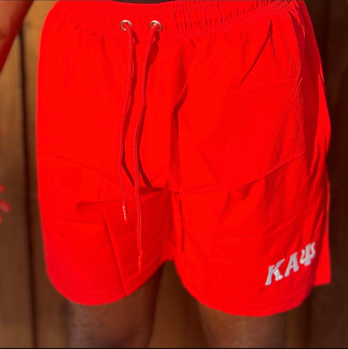 Enjoy your spring & summer with a Nupe Kave shorts constructed from a premium polyester blend that is ultra-soft and comfortable. This short is lightweight with moisture-wicking fabric is antimicrobial to keep you dry and feeling fresh. Perfect for an early morning workout or dip in the ocean while on vacation. Finished with pockets and an elasticated waist band with drawstrings for the phones and extra items.