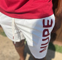 “NUPE” Cream Shorts