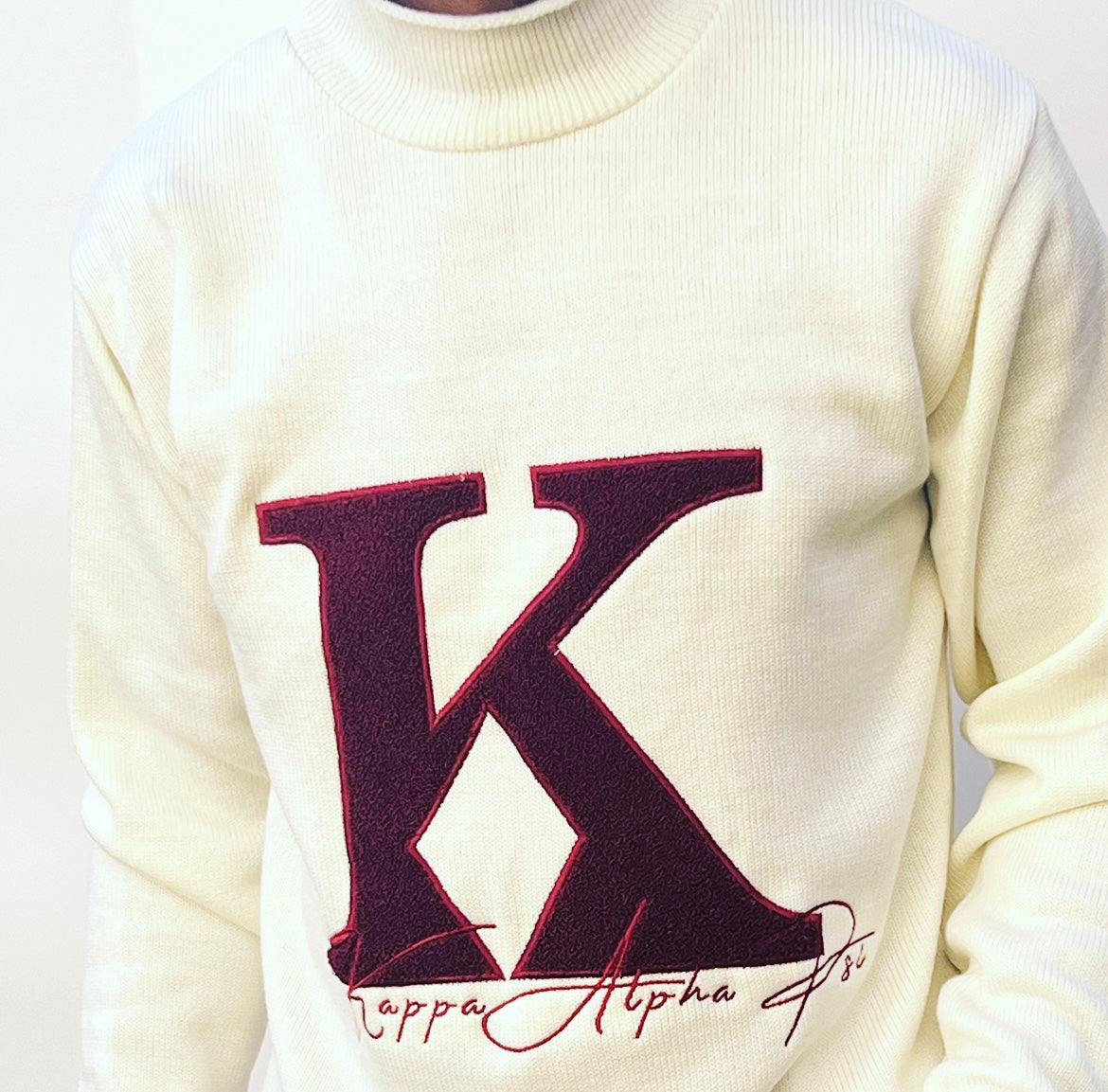 Exclusive Kappa Alpha Psi Chenille Appliqué Embroidery Crimson Sweater. This is the perfect long-sleeved Sweater to wear while showing off your Kappa Alpha Psi fraternity . A comfortable 100% Acrylic with a Chenille K diamond and Kappa Alpha Psi embroidery across the chest give you the perfect fit. This sweater is also a perfect gift for your favorite Kappa Man.