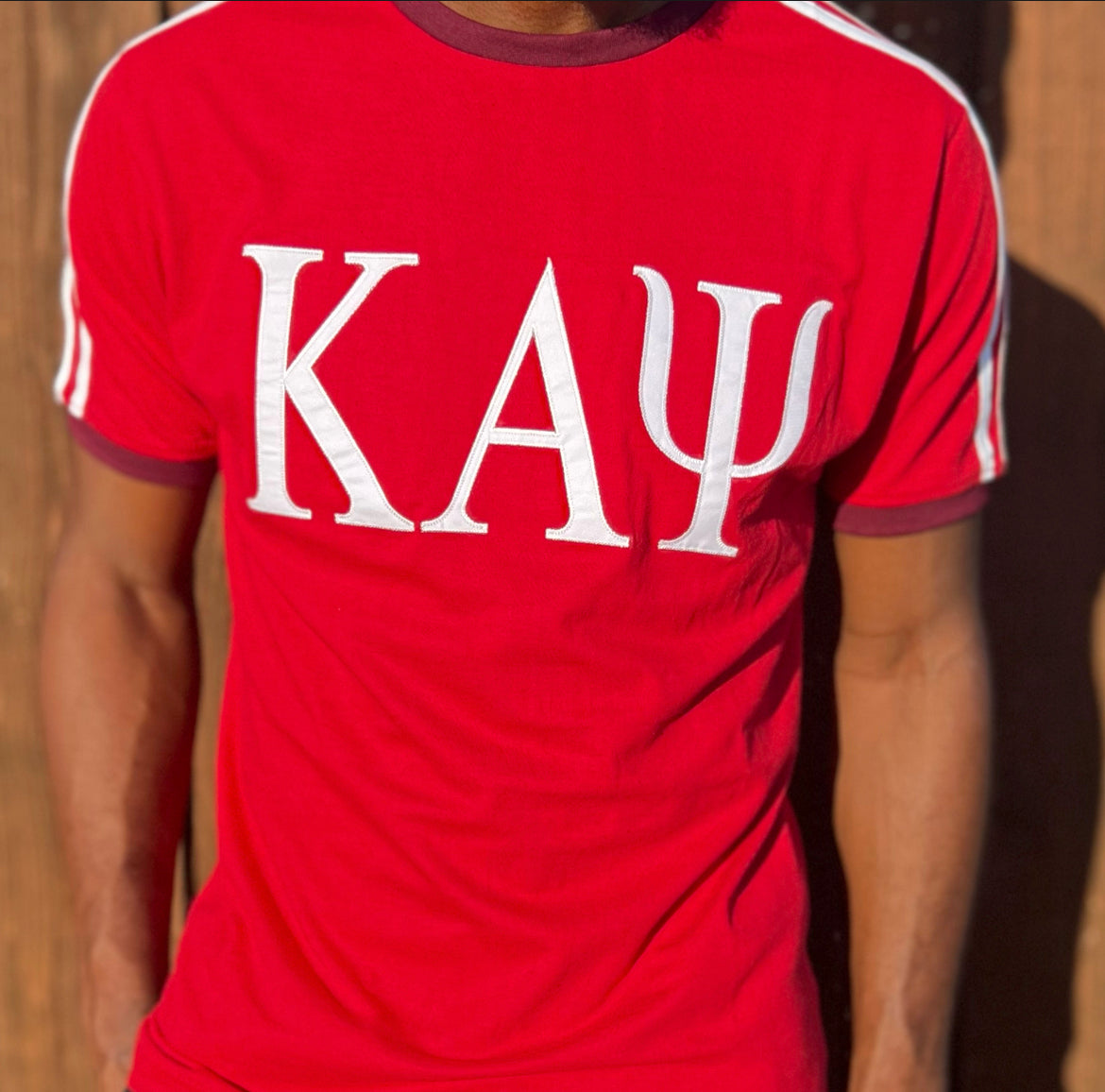 Show your love for Kappa Alpha Psi with this single embroidery T-shirt in stunning red and white color. It's perfect for any member of the fraternity who wants to represent their organization in style. Made from high-quality materials, this shirt is soft, comfortable, and durable, making it perfect for daily wear. The embroidery on the shirt is expertly done, giving it a stylish and sophisticated look that is sure to turn heads.