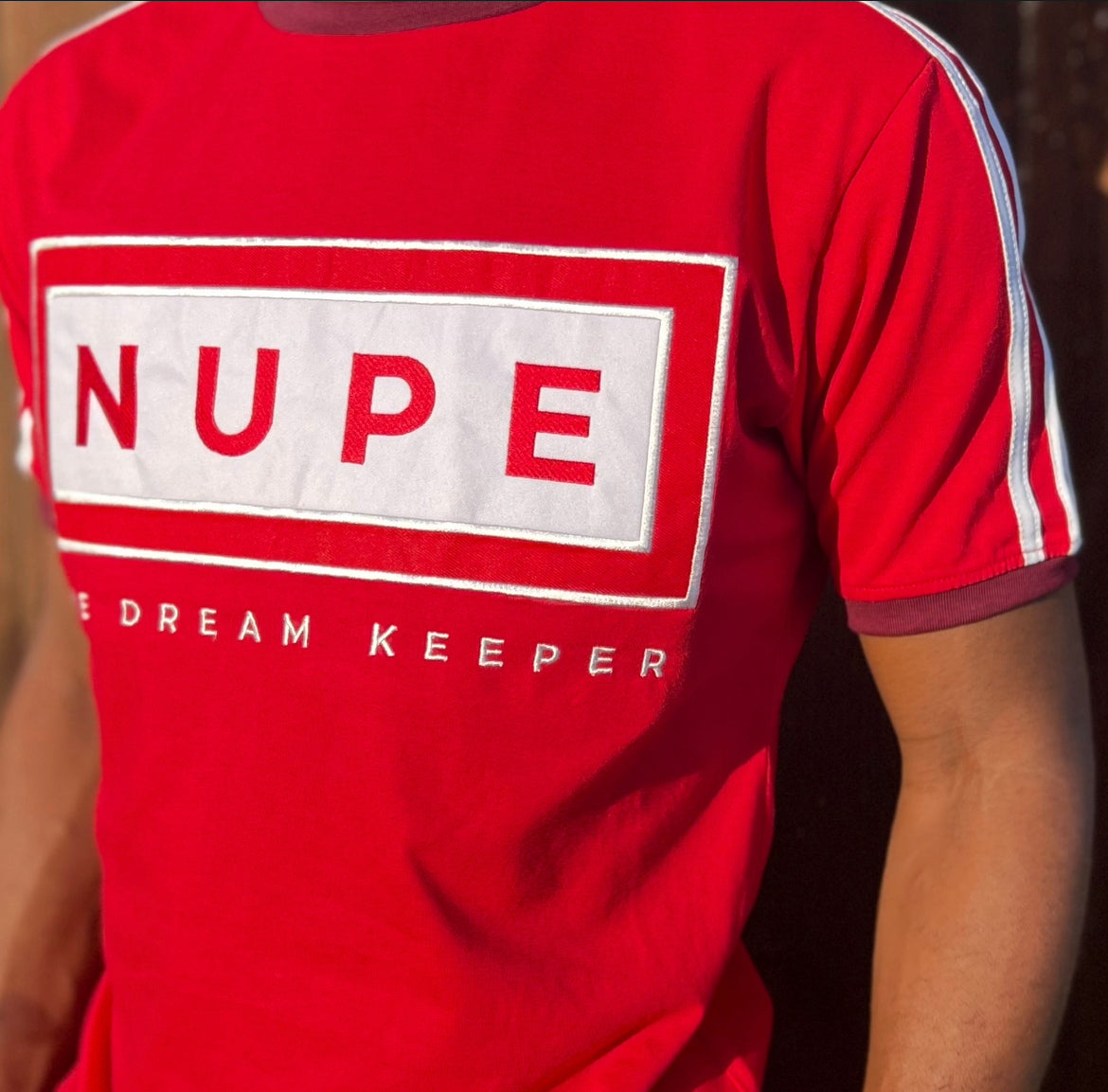 Whether you're attending a fraternal event or just want to represent your affiliation, this T-shirt is the perfect choice. It's made from high-quality materials that are designed to be both comfortable and durable, and it features the classic "NUPE" design that is instantly recognizable to anyone who is a member of Kappa Alpha Psi. So if you want to show off your affiliation in style, be sure to add this T-shirt to your collection today!