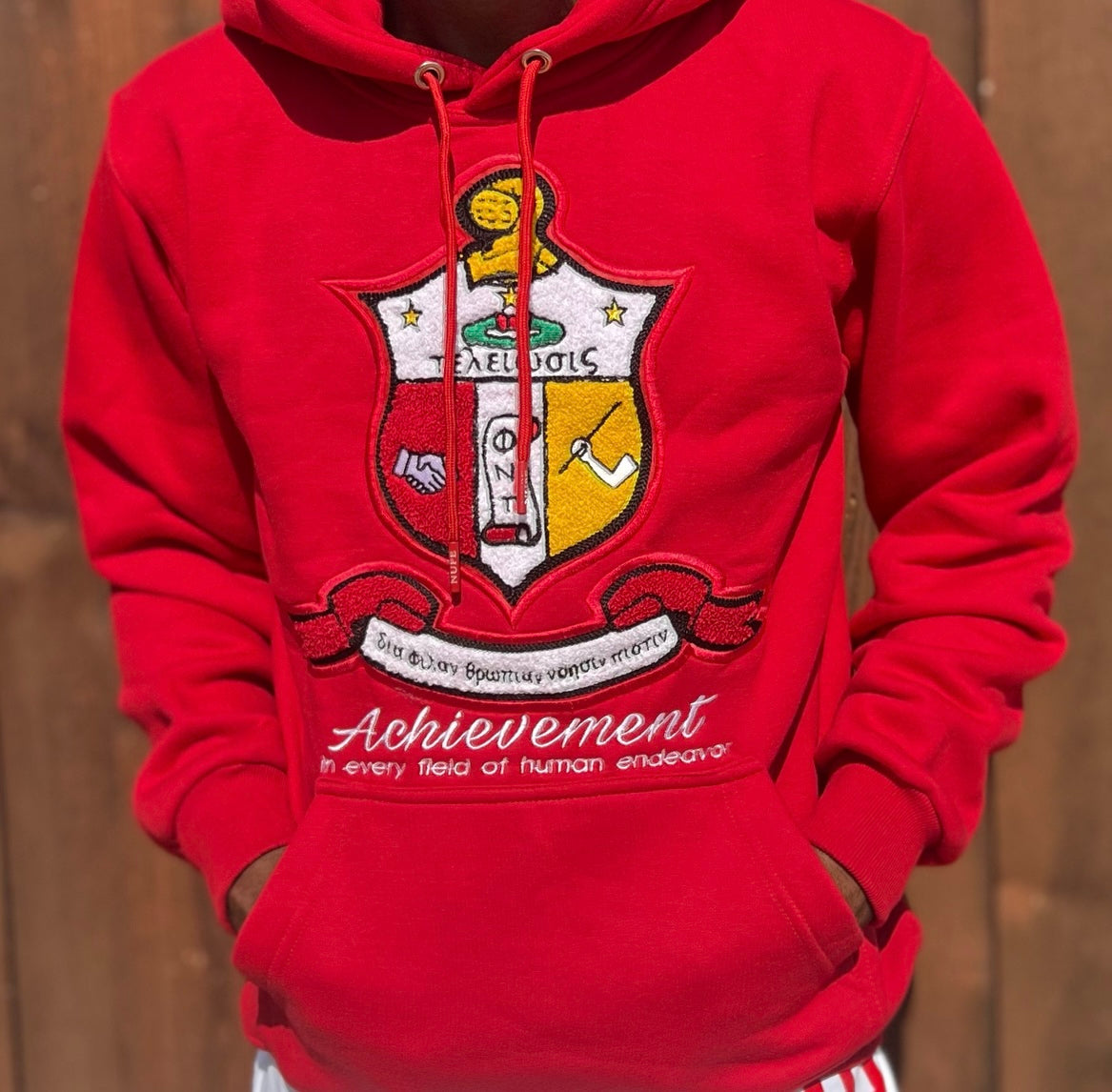 Introducing the Kappa Alpha Psi "Shield" hoodie, a stylish and comfortable addition to any wardrobe. Showcasing the iconic shield logo of the historic fraternity, this hoodie is perfect for any Kappa Alpha Psi member .  Crafted from high-quality materials, this hoodie is designed to withstand the test of time. With a classic design and comfortable fit, it is the perfect choice for any casual occasion. Ideal for men, this hoodie is a must-have for any fashion-conscious individual looking to make a statement.