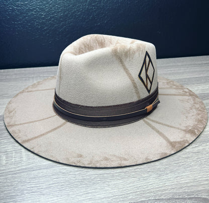Elevate your style with this premium Kappa Alpha Psi fedora. Crafted from high-quality wool, this hat exudes sophistication and class. Perfect for the modern man who wants to make a fashion statement, this fedora features the iconic Kappa branding, showcasing your love for the fraternity. Designed for men who appreciate quality and elegance, this fedora is perfect for any occasion.