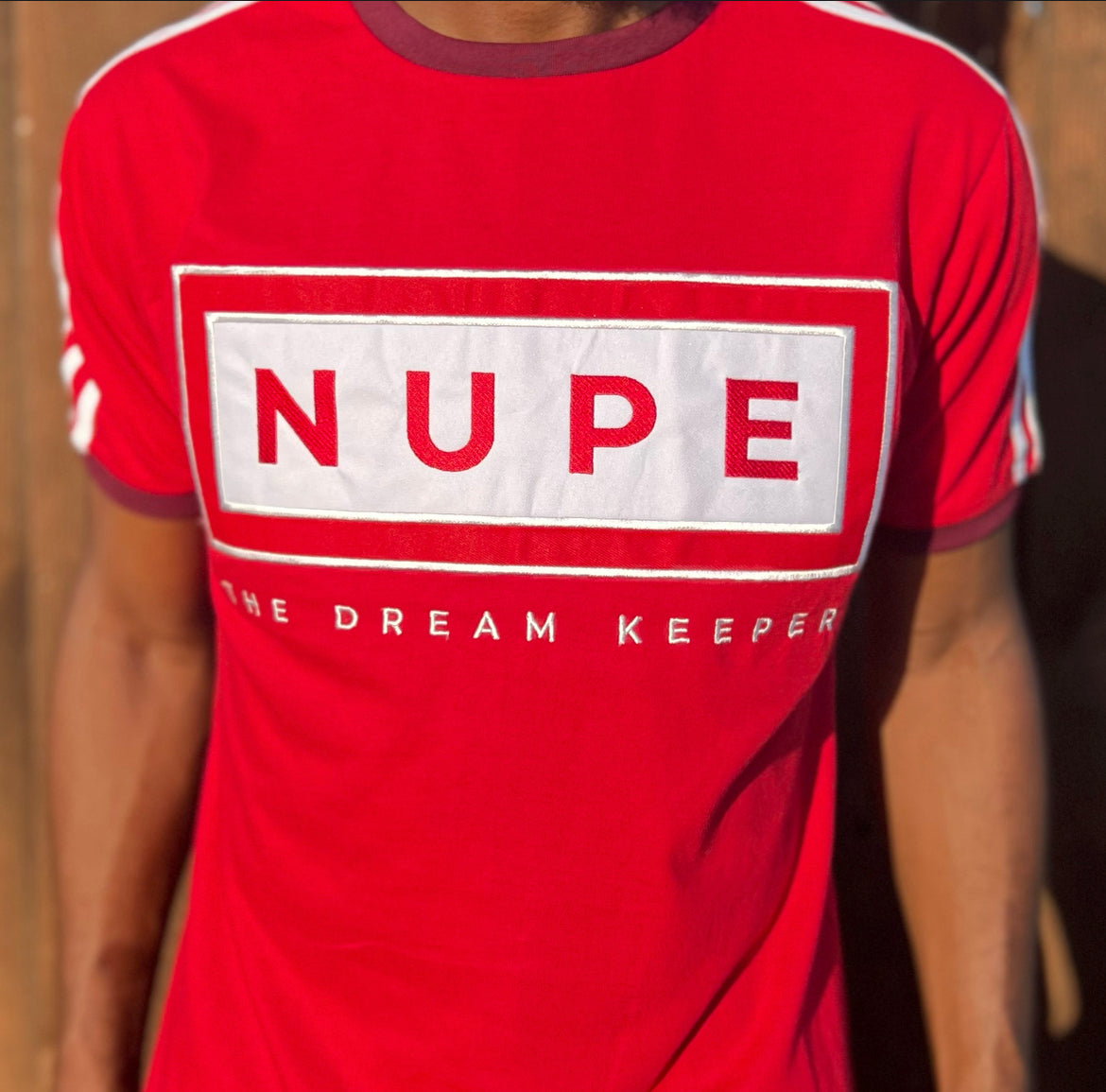 Whether you're attending a fraternal event or just want to represent your affiliation, this T-shirt is the perfect choice. It's made from high-quality materials that are designed to be both comfortable and durable, and it features the classic "NUPE" design that is instantly recognizable to anyone who is a member of Kappa Alpha Psi. So if you want to show off your affiliation in style, be sure to add this T-shirt to your collection today!