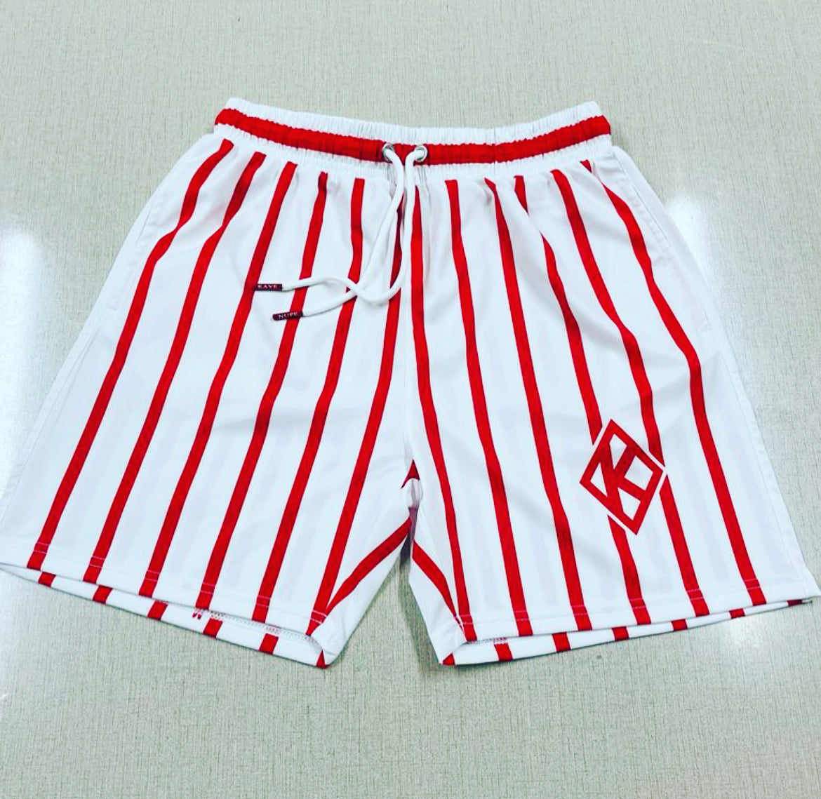 Made with high-quality materials, these shorts are durable and built to last. With features like a drawstring waist and convenient pockets, they are both functional and stylish. Whether you're lounging by the pool or playing beach volleyball, these Kappa Alpha Psi shorts are sure to make a statement.