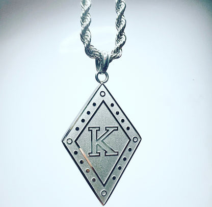 A beyond stunning Kappa Alpha Psi necklace and charm made with 24k stainless steel silver. This pendant is made to last for generations and generations, perfect for that special Kappa Alpha Psi member. The ultimate gift to show off your fraternity pride is here!  • Official Kappa Alpha Psi Licensed Product: passed through examination and requirements by the Fraternity as a whole.
