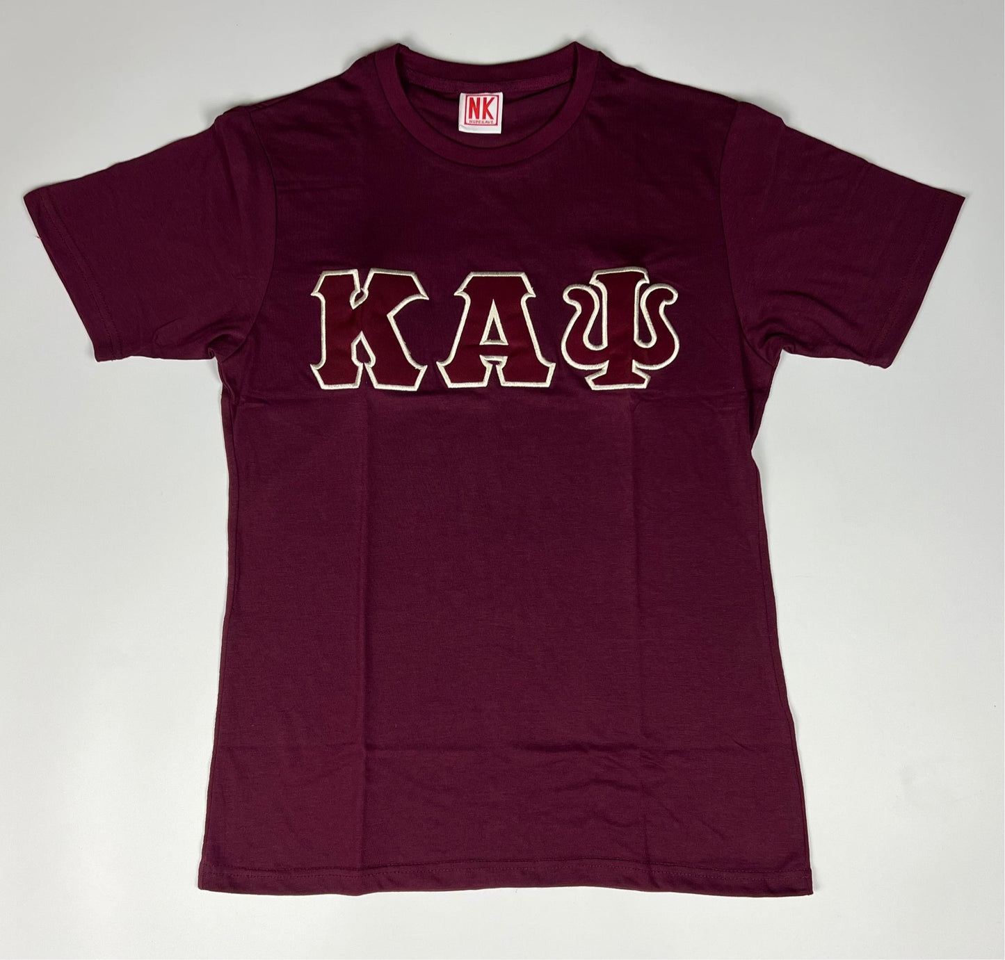Nupe Kave Exclusive Kappa Alpha Psi Double Stitched Appliqué Embroidery Lettered T-shirt . This is the perfect short-sleeved shirt to wear while showing off your Kappa Alpha Psi fraternity lettering. A comfortable 100% cotton tee with a twill Greek letters embroidery across the chest give you the perfect fit. This shirt is also a perfect gift for your favorite Kappa Man.