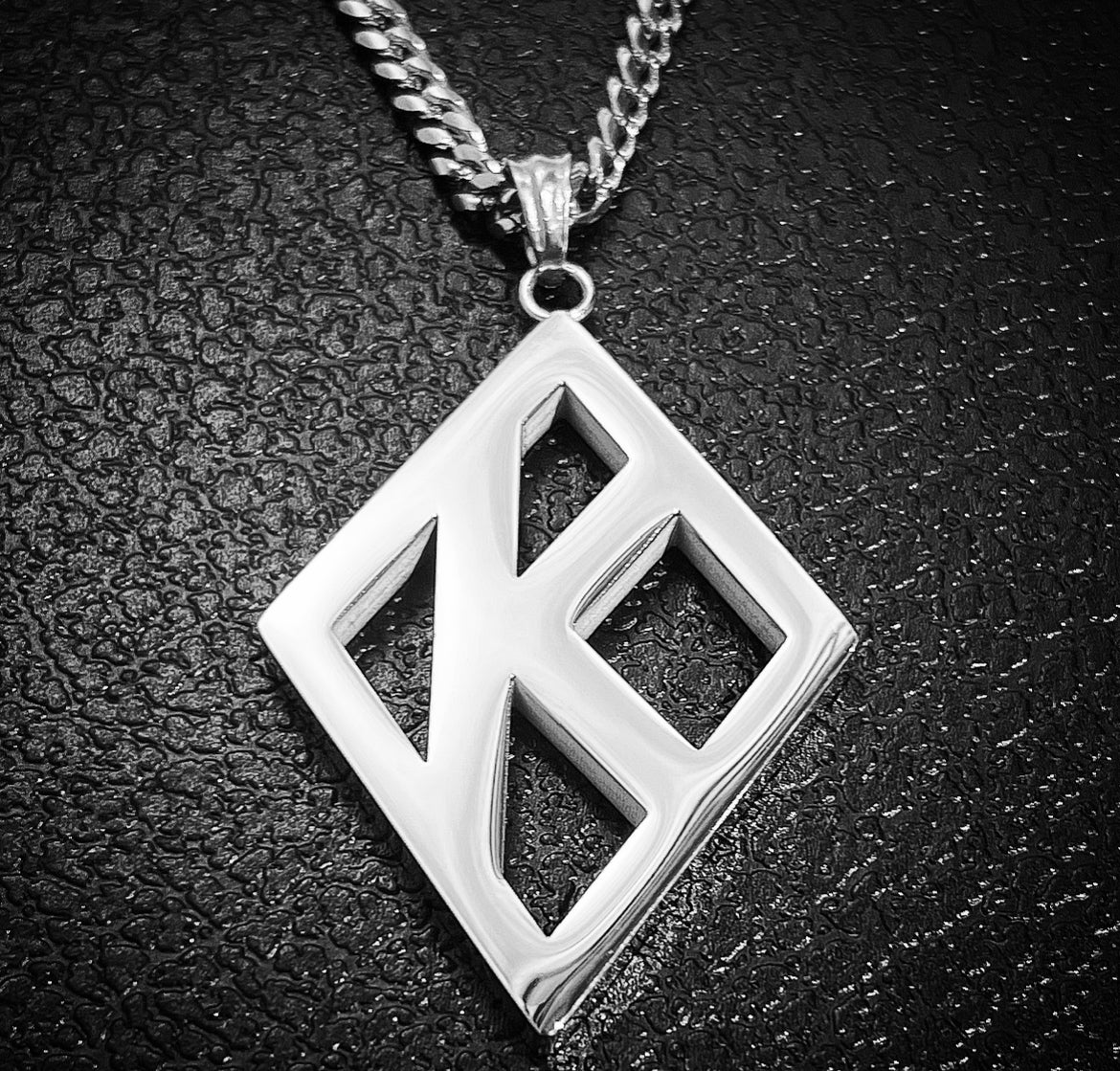 A beyond stunning Kappa Alpha Psi floating K necklace and charm made with solid stainless steel Silver. This pendant is made to last for generations and generations, perfect for that special Kappa Alpha Psi member. The ultimate gift to show off your fraternity pride is here!  • Official Kappa Alpha Psi Licensed Product: passed through examination and requirements by the Fraternity as a whole.