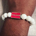 Kappa Alpha Psi fraternity exclusive Glass Beaded Bracelet on elastic stretch rope; simple and elegant. Easy bracelet to slide on and off wrist. The color of amber beads may vary from bracelet to bracelet due to each bracelet being hand made from natural materials with a personal touch.