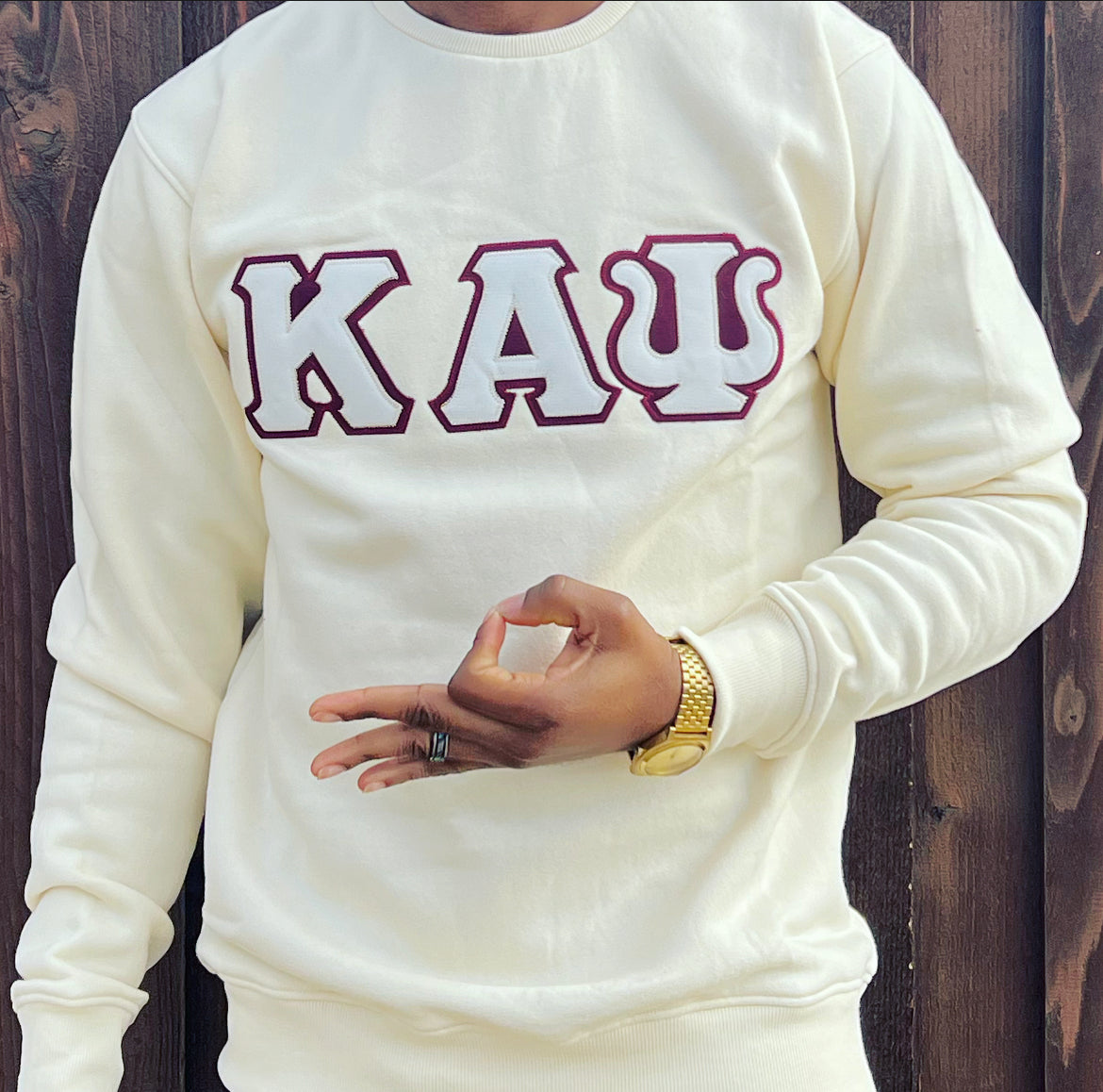 Exclusive Kappa Alpha Psi Double Stitched Appliqué Embroidery Lettered Cream Sweater. This is the perfect long-sleeved Sweater to wear while showing off your Kappa Alpha Psi fraternity lettering. A comfortable 100% cotton tee with a twill Greek letters embroidery across the chest give you the perfect fit. This sweater is also a perfect gift for your favorite Kappa Man.