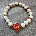 Kappa Alpha Psi fraternity exclusive Glass Beaded Bracelet on elastic stretch rope; simple and elegant. Easy bracelet to slide on and off wrist. The color of amber beads may vary from bracelet to bracelet due to each bracelet being hand made from natural materials with a personal touch.