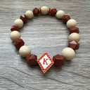 Kappa Alpha Psi fraternity exclusive Glass Beaded Bracelet on elastic stretch rope; simple and elegant. Easy bracelet to slide on and off wrist. The color of amber beads may vary from bracelet to bracelet due to each bracelet being hand made from natural materials with a personal touch.