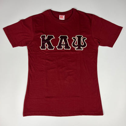 Nupe Kave Exclusive Kappa Alpha Psi Double Stitched Appliqué Embroidery Lettered T-shirt . This is the perfect short-sleeved shirt to wear while showing off your Kappa Alpha Psi fraternity lettering. A comfortable 100% cotton tee with a twill Greek letters embroidery across the chest give you the perfect fit. This shirt is also a perfect gift for your favorite Kappa Man.